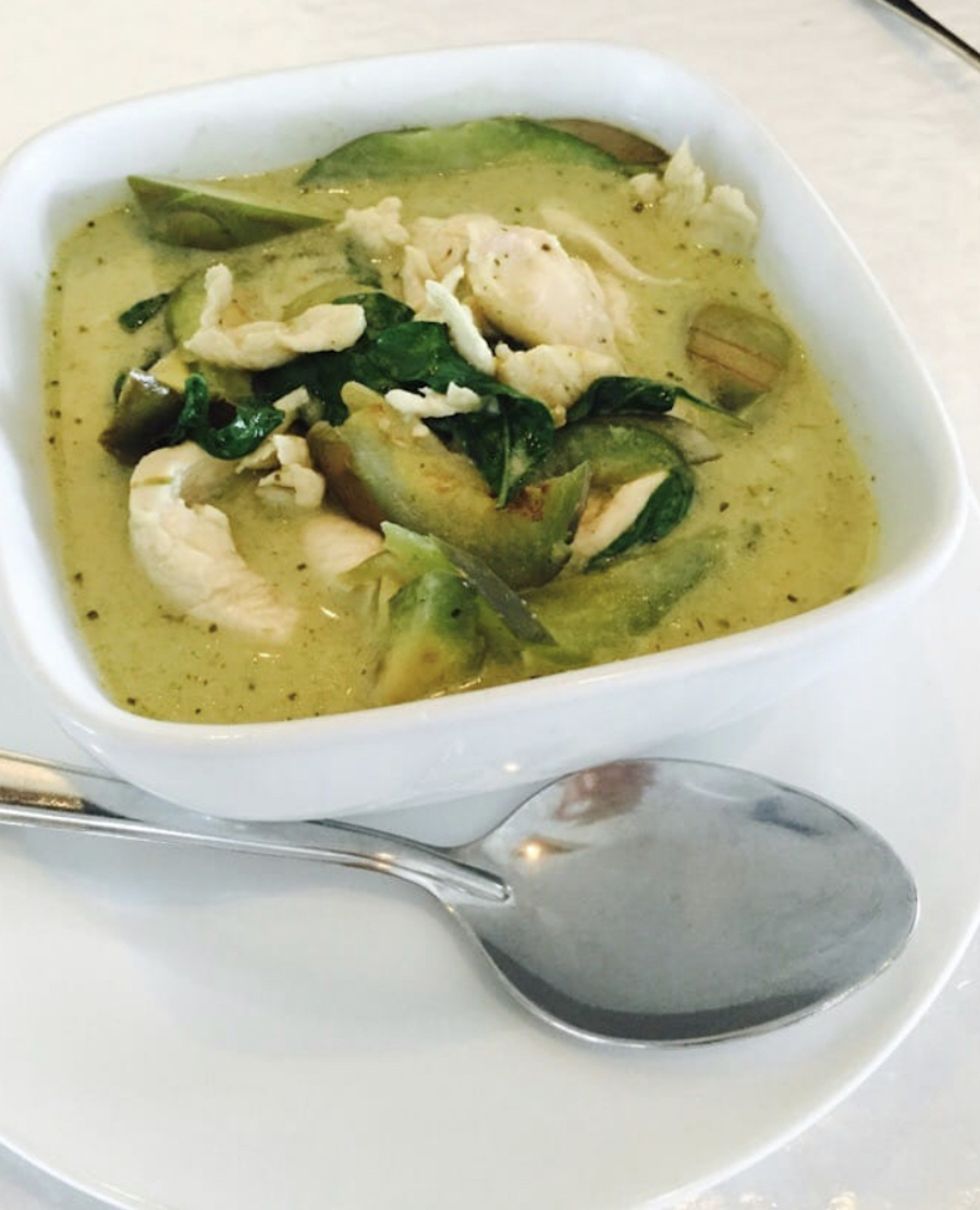 Green Curry - House Green curry sauce with coconut milk and local eggplant and Thai basil with your choice of protien.